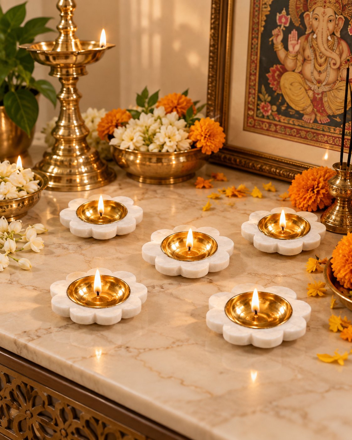 Compact marble diyas lined along a table runner