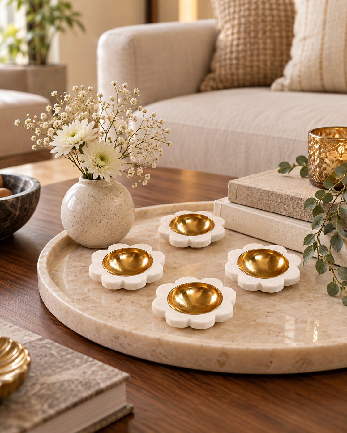 Marble tealight diyas on a mandir shelf