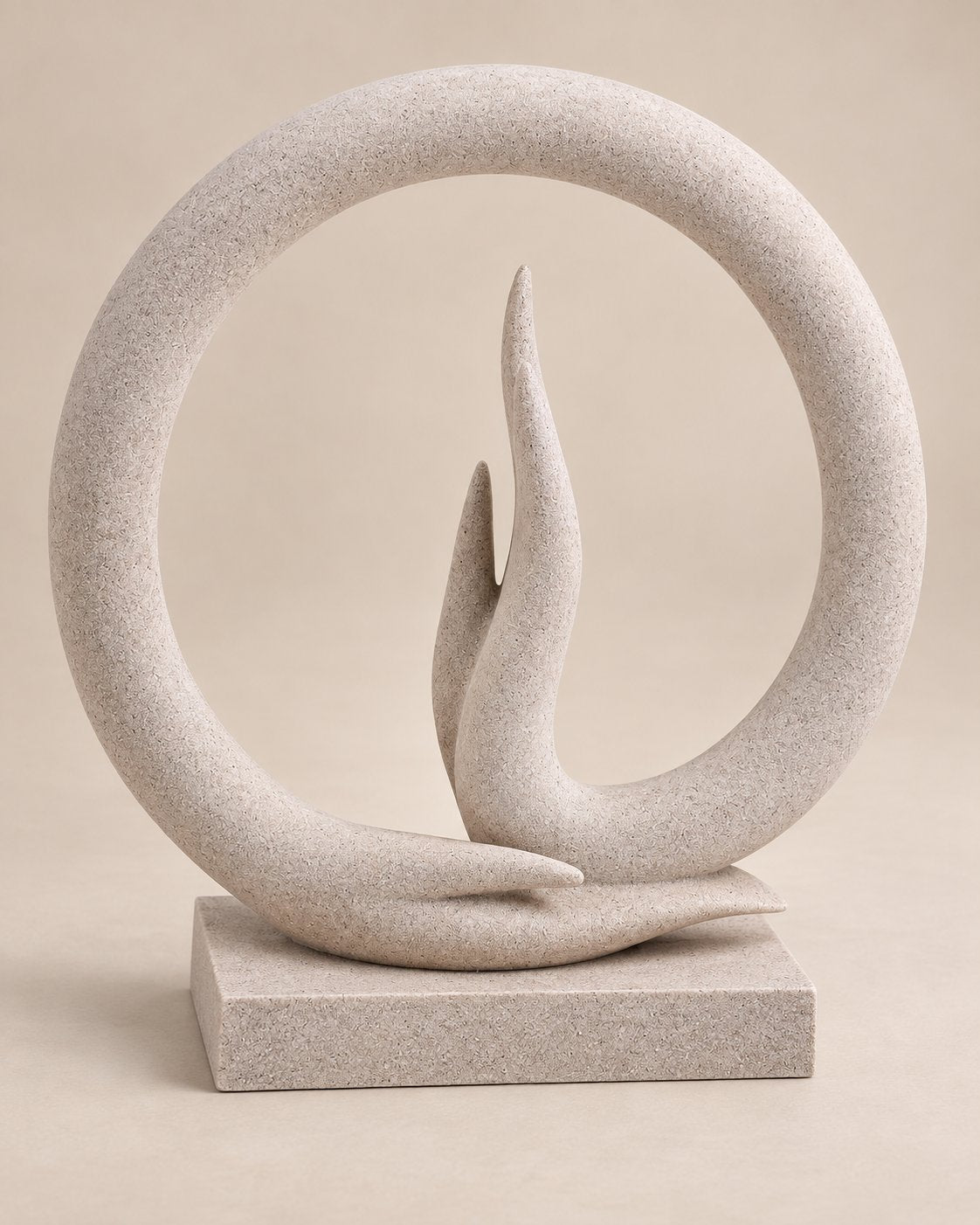 Carved marble ring enclosing a flame form