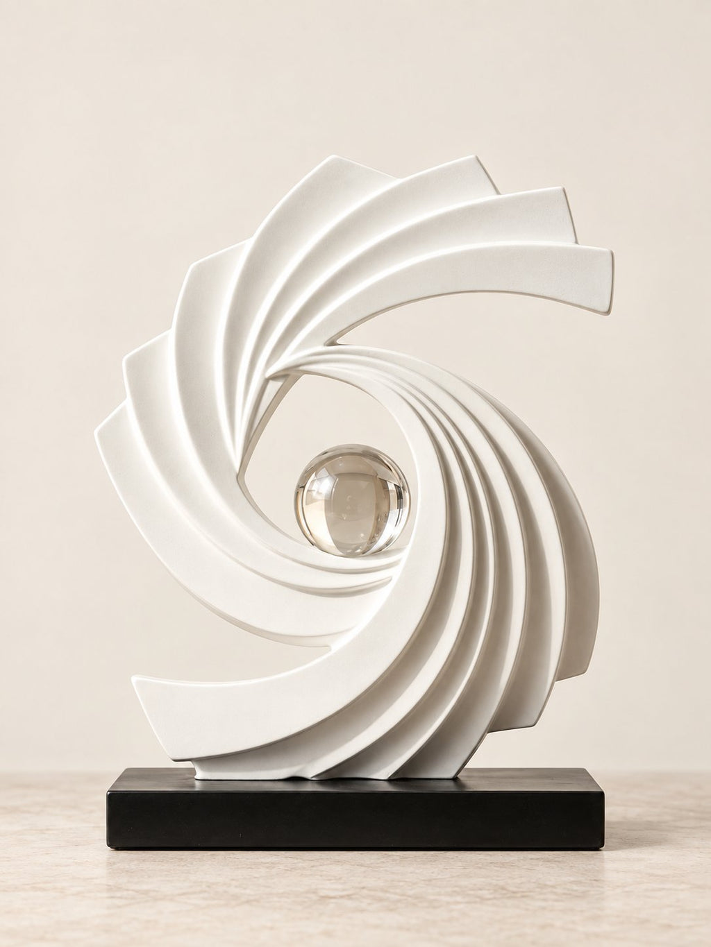 Spiral vortex sculpture in Banswara marble with glass sphere